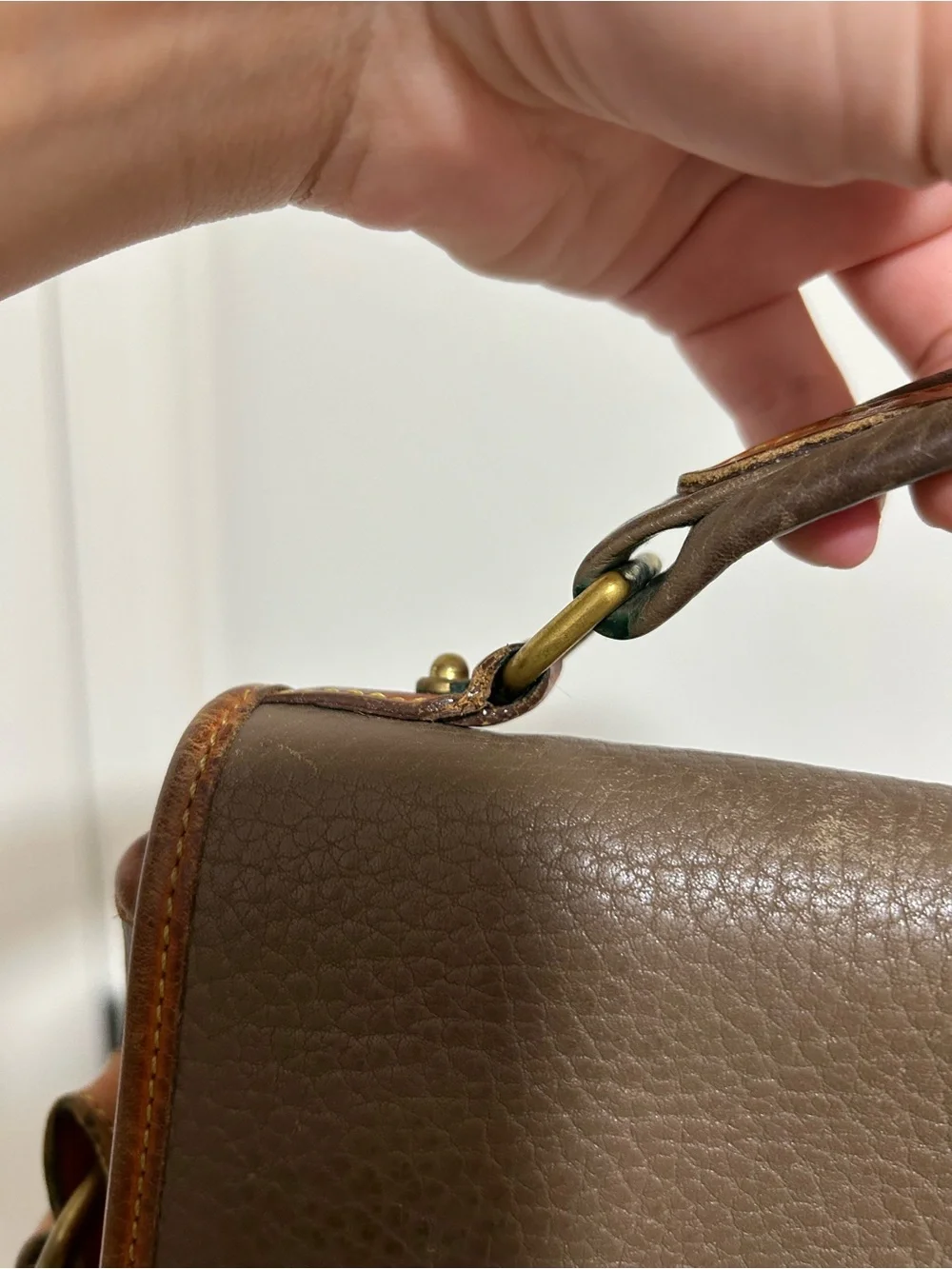 Dooney & Bourke Brown and Tan Pebble Leather Messenger